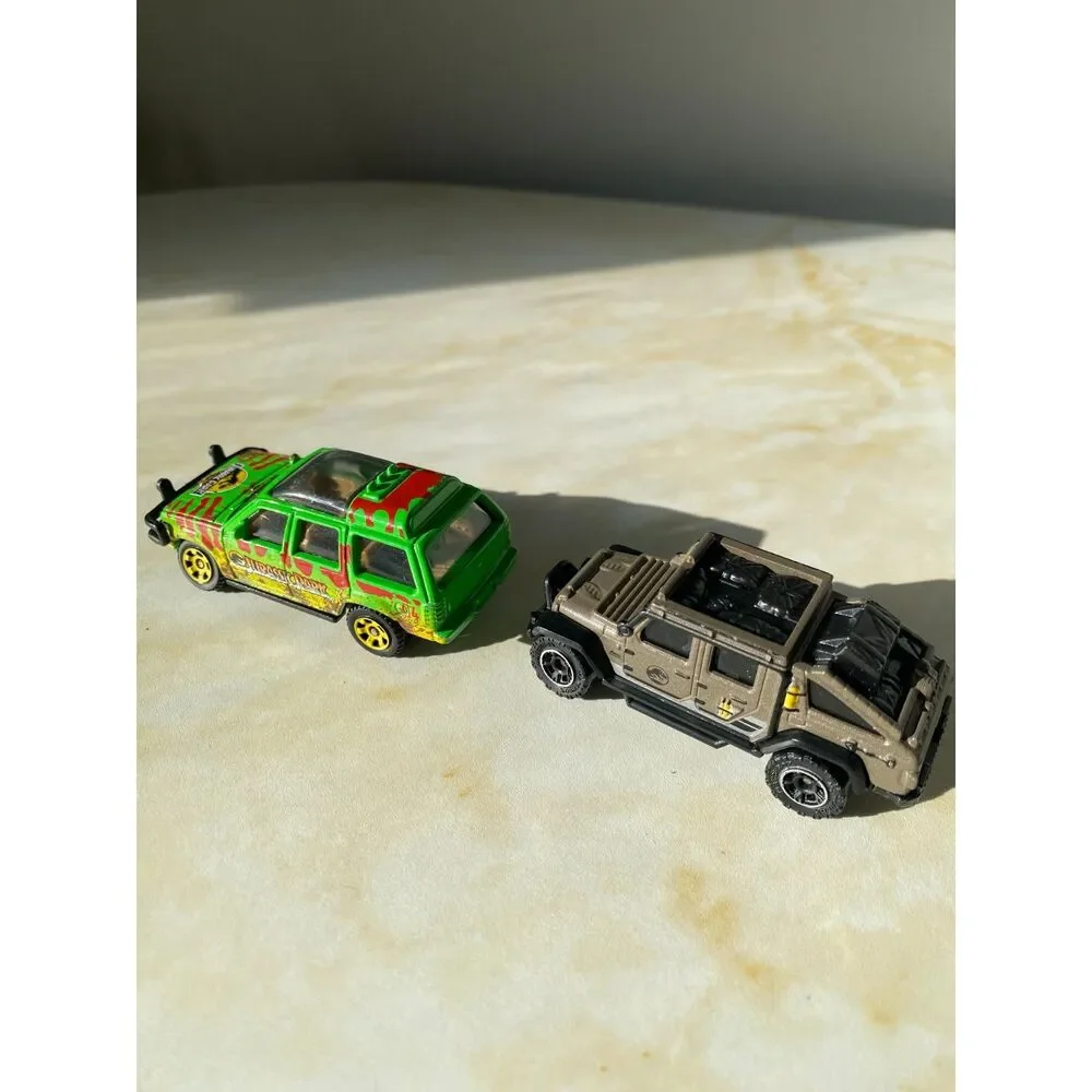 Matchbox 1992 Jeep Wrangler Sahara Jurassic Park Ford Explorer Dinosaur Print
